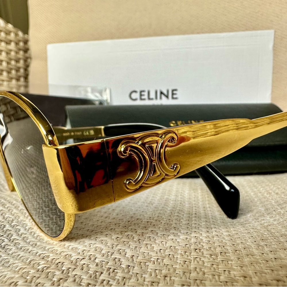 SOLD: Celine metal Triomphe Black and Gold oval Women's Sunglasses (CL40235U)